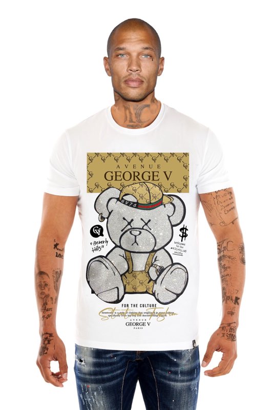 Avenue George V with teddy bear in overalls and backwards baseball cap graphic tee.