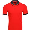 Vassari branded fashion polo in red with black buttons and collar.